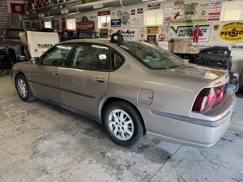 Chevy Impala window tint: 5% all sides and rear and windshield strip