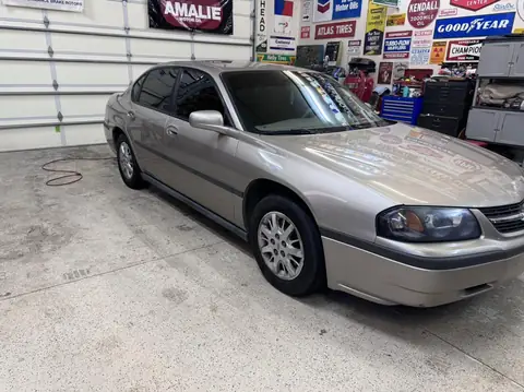 Chevy Impala window tint: 5% all sides and rear and windshield strip (view 3)