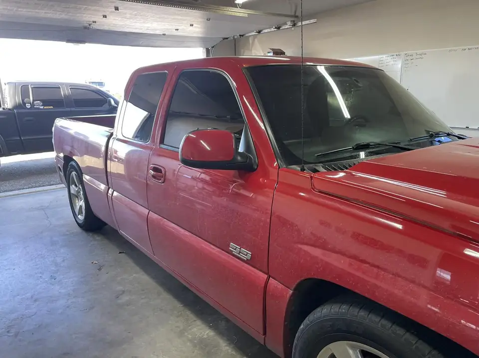 Chevy Silverado window tint: Old tint removed on fronts, New 5% Premium Ceramic installed (view 2)