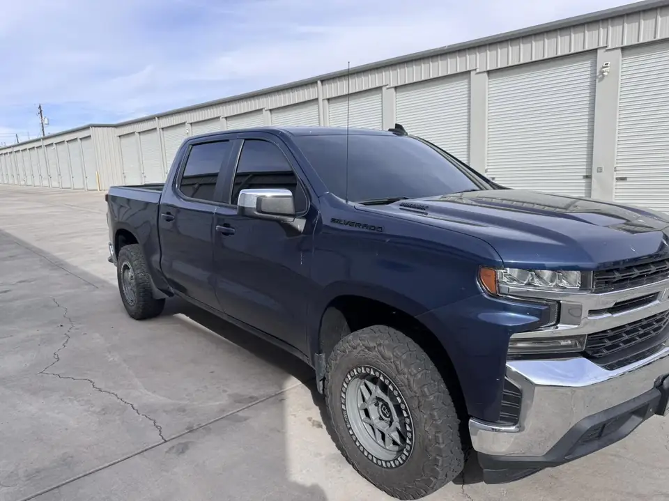 Chevy Silverado window tint: Removal on front doors, Installed new 5% front doors, 35% full windshield (view 2)
