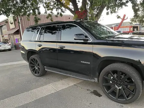 Chevy Tahoe window tint: 35% Ceramic Front doors (view 2)
