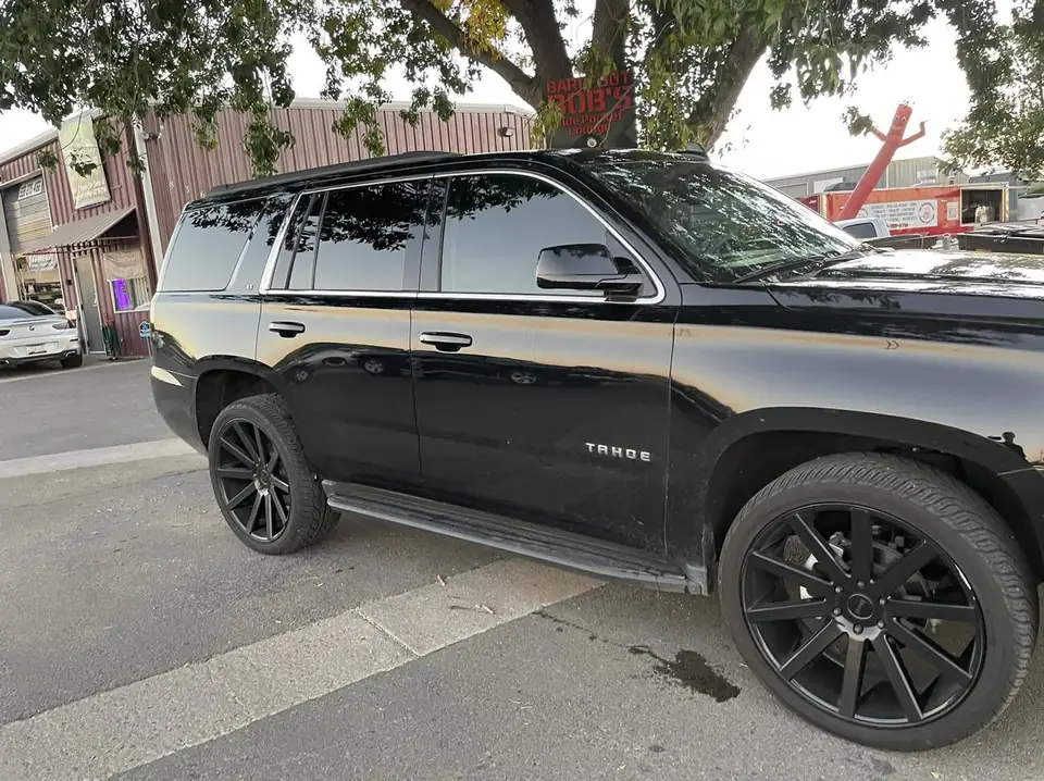 Chevy Tahoe window tint: 35% Ceramic Front doors (view 2)
