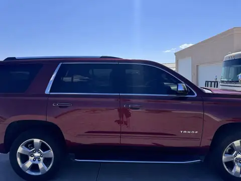 Chevy Tahoe window tint: 15% carbon Ceramic front doors, 5% sunstrip