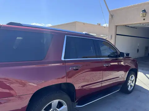 Chevy Tahoe window tint: 15% carbon Ceramic front doors, 5% sunstrip (view 2)