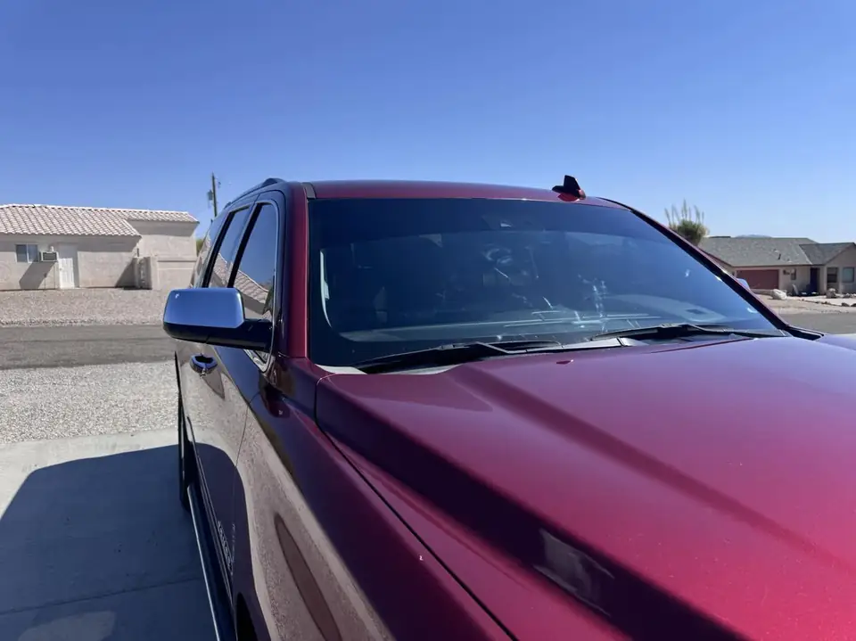 Chevy Tahoe window tint: 15% carbon Ceramic front doors, 5% sunstrip (view 3)