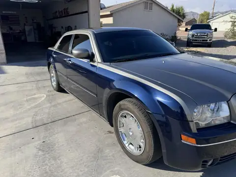 Chrysler 300 window tint: Installed our 15% carbon Ceramic on the doors and rear glass, 3% carbon ceramic sun roof, 5% windshield strip