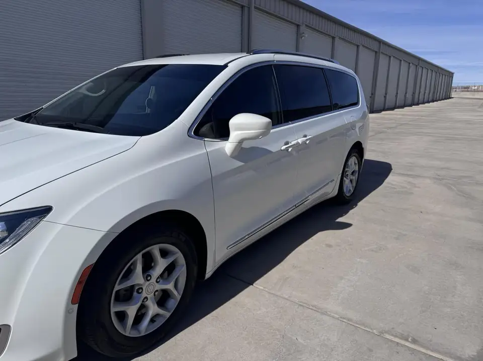 Chrysler Pacifica window tint: 5% C-IR rear half and sunstrip, 35% C-IR front doors and pockets (view 2)