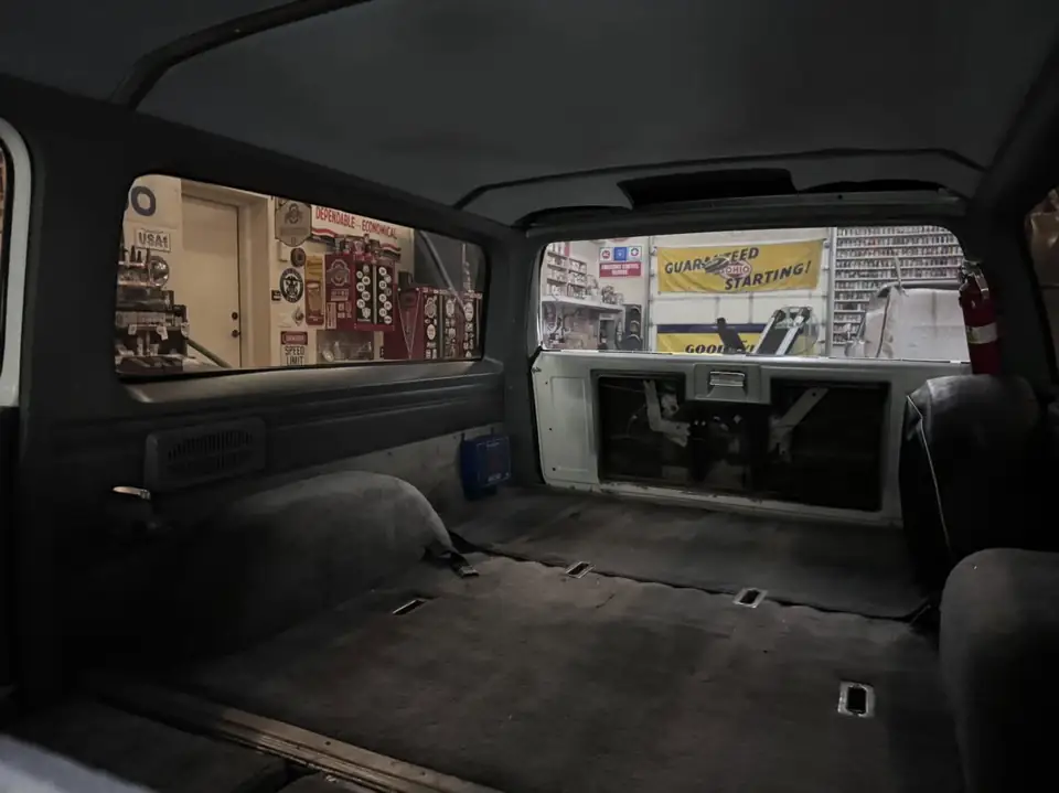 Classic Chevy Suburban window tint: Installed 5% on the two front doors and the rear hatch, Installed 15% on the rear doors and rear cargo windows (view 5)