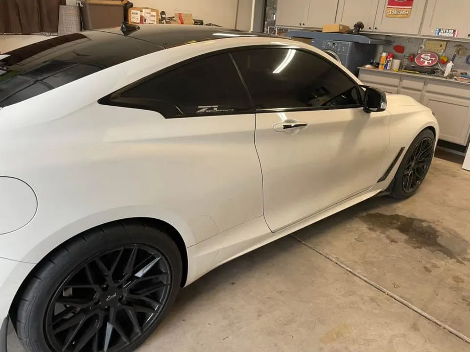 White coupe with fresh dark window tint