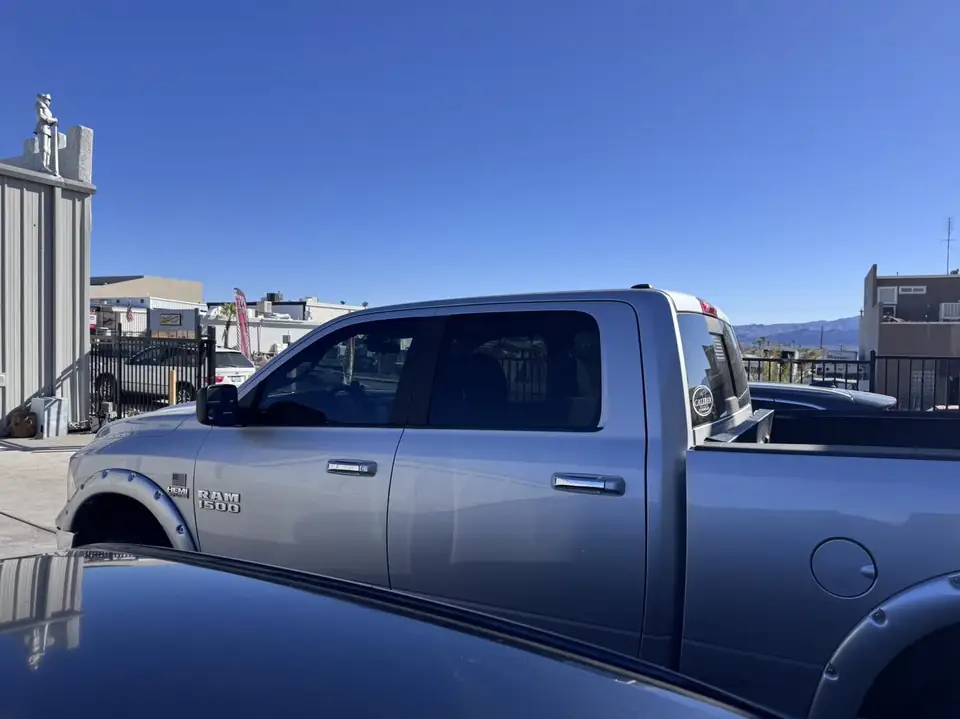 Dodge Ram 1500 window tint: 35% C-IR front doors (view 2)
