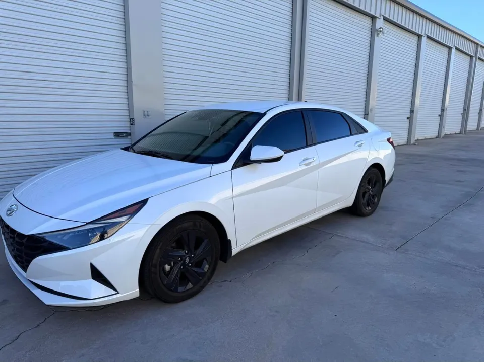 White Hyundai Elantra with fresh tint