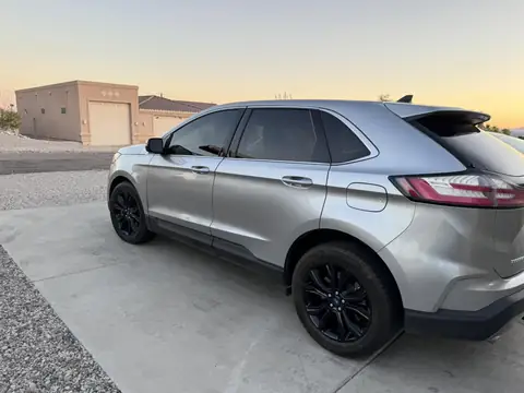 Ford Edge window tint: 20% Carbon Ceramic front doors, 3% sun strip
