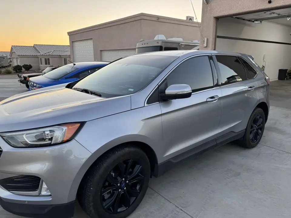 Ford Edge window tint: 20% Carbon Ceramic front doors, 3% sun strip (view 2)