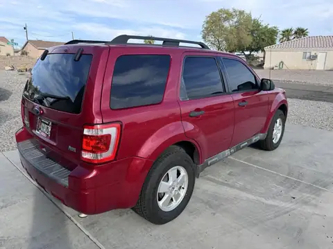 Ford Edge window tint: 5% Carbon Ceramic rear 5 privacy windows, 3% Carbon Ceramic front doors, 3% Sunstrip (view 2)