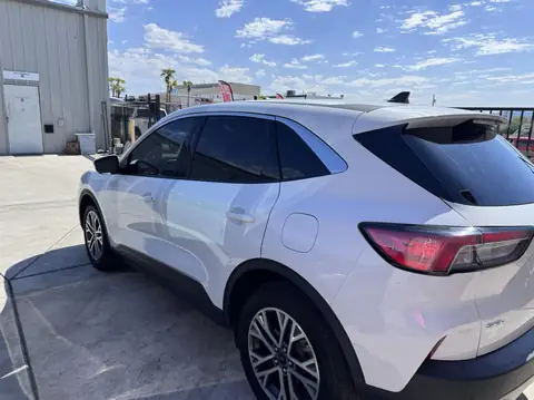 Ford Escape window tint: 5% over rear half privacy glass, 15% front doors, 5% sunstrip