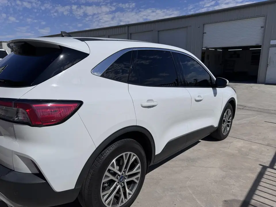 Ford Escape window tint: 5% over rear half privacy glass, 15% front doors, 5% sunstrip (view 2)