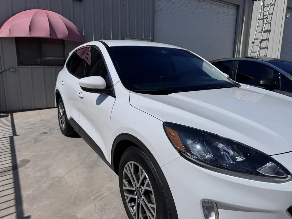 Ford Escape window tint: 5% over rear half privacy glass, 15% front doors, 5% sunstrip (view 3)