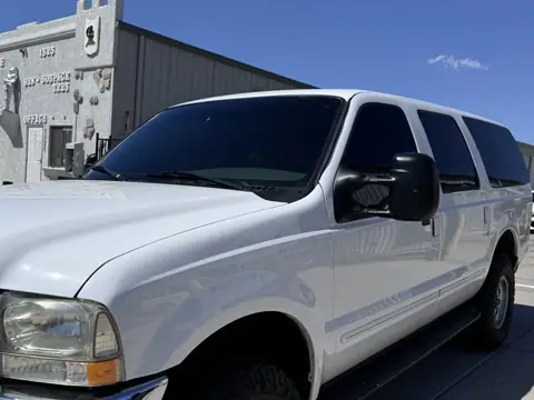 Ford Excursion window tint: Remove faded film on front doors, New 15% front doors, 50% full windshield, 5% sun strip