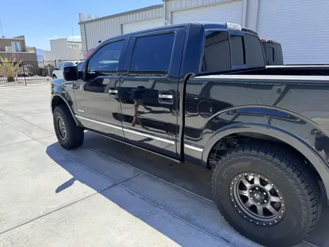 Ford F-150 window tint: Remove film from front doors, New 15% front doors, 25% over rear privacy windows, 5% sunstrip