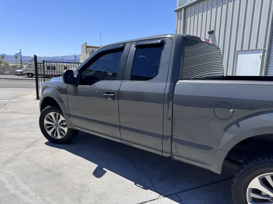 Ford F-150 window tint: F150 35% over factory privacy rear windows, 15% front doors (view 2)