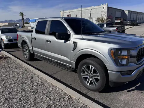 Ford F-150 window tint: Removal on 4 doors, Added a layer of 20% C-IR on the rear window privacy glass, 5% C-IR on the 4 doors and sunstrip (view 3)