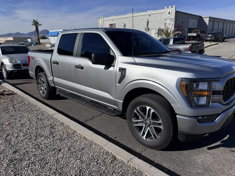 Ford F-150 window tint: Removal on 4 doors, Added a layer of 20% C-IR on the rear window privacy glass, 5% C-IR on the 4 doors and sunstrip (view 3)