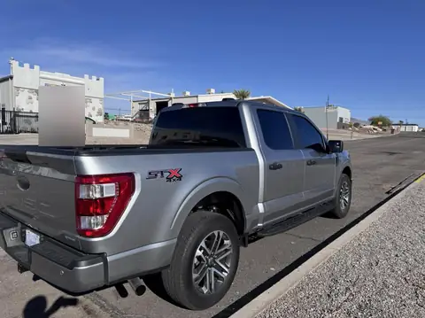Ford F-150 window tint: Removal on 4 doors, Added a layer of 20% C-IR on the rear window privacy glass, 5% C-IR on the 4 doors and sunstrip (view 4)