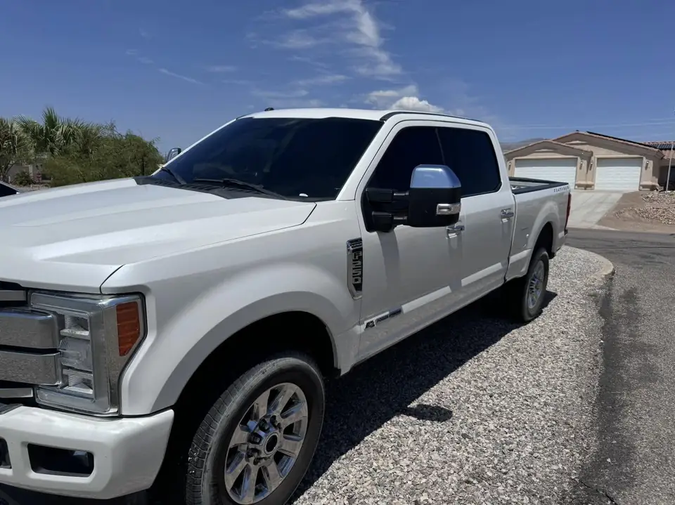 Ford F-250 window tint: 5% Ceramic rear 3 windows, 20% Ceramic front doors, 50% Ceramic full windshield (view 2)