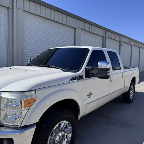 Ford F-250 window tint: Removed old tint from front doors, New 5% sides and rear, 15% full windshield