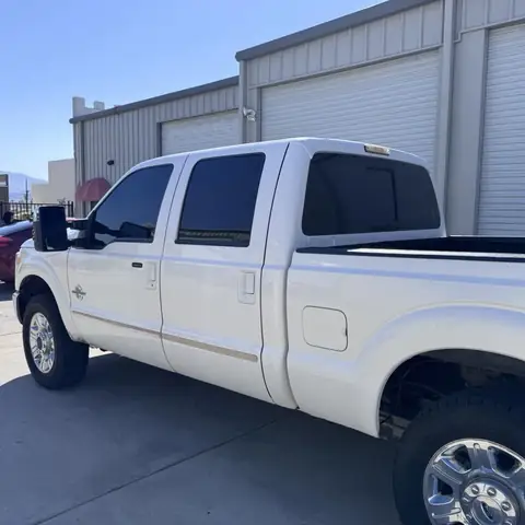 Ford F-250 window tint: Removed old tint from front doors, New 5% sides and rear, 15% full windshield (view 2)