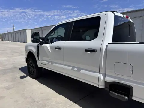 Ford F-250 window tint: 25% front doors to match rear, 5% sunstrip