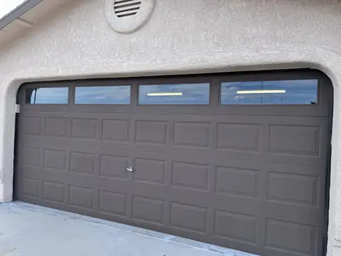 Garage door windows in 5% dual reflective film: Tired of the sun beating through while trying to do some work in the garage/shop? Give us a call for