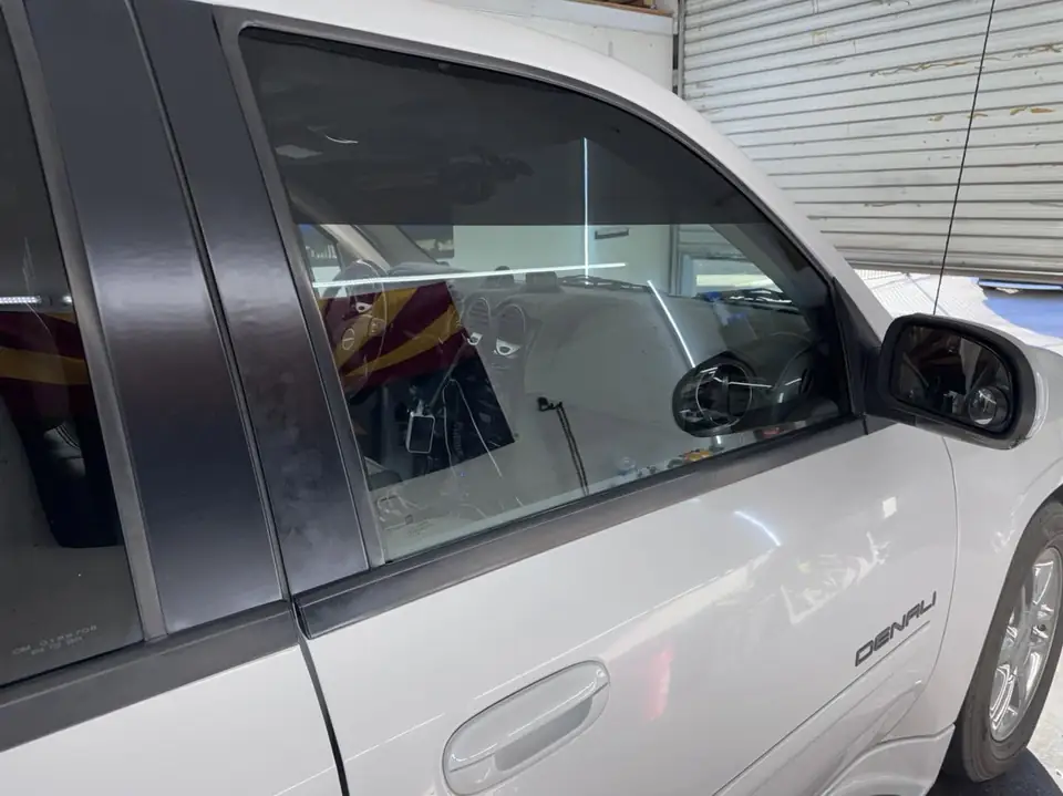 GMC Denali glare strips and windshield tint: Did a couple glare strips on the top 8 inches of driver and passenger windows and a 50% C-IR for the (view 2)