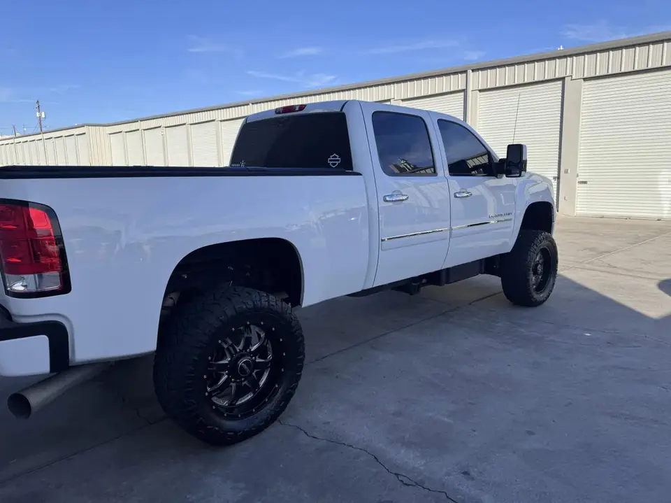 GMC Sierra window tint: Removal of old film, Installed new 5% sides and rear, 40% full windshield (view 2)