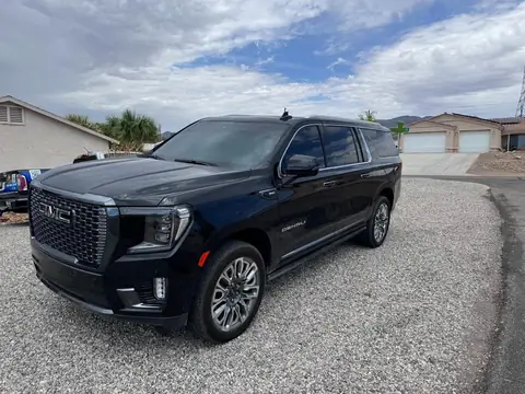 GMC Yukon Denali window tint: Removal on front 2 windows, 3% Carbon Ceramic all sides and rear, 50% Carbon Ceramic full windshield, 3% Sunstrip