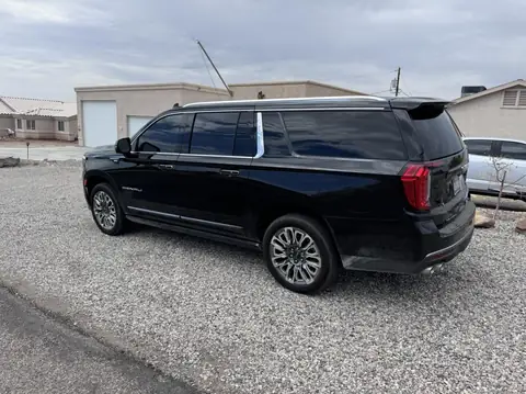 GMC Yukon Denali window tint: Removal on front 2 windows, 3% Carbon Ceramic all sides and rear, 50% Carbon Ceramic full windshield, 3% Sunstrip (view 2)
