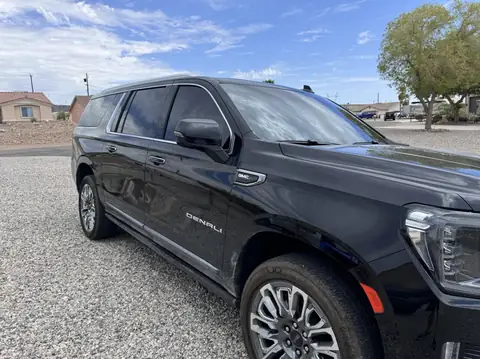 GMC Yukon Denali window tint: Removal on front 2 windows, 3% Carbon Ceramic all sides and rear, 50% Carbon Ceramic full windshield, 3% Sunstrip (view 3)