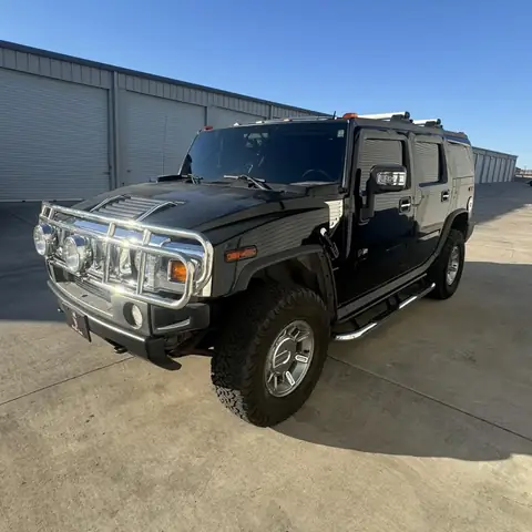 Hummer H2 window tint: Remove old film from front doors, New 5% C-IR sides and rear hatch, 50% C-IR full windshield