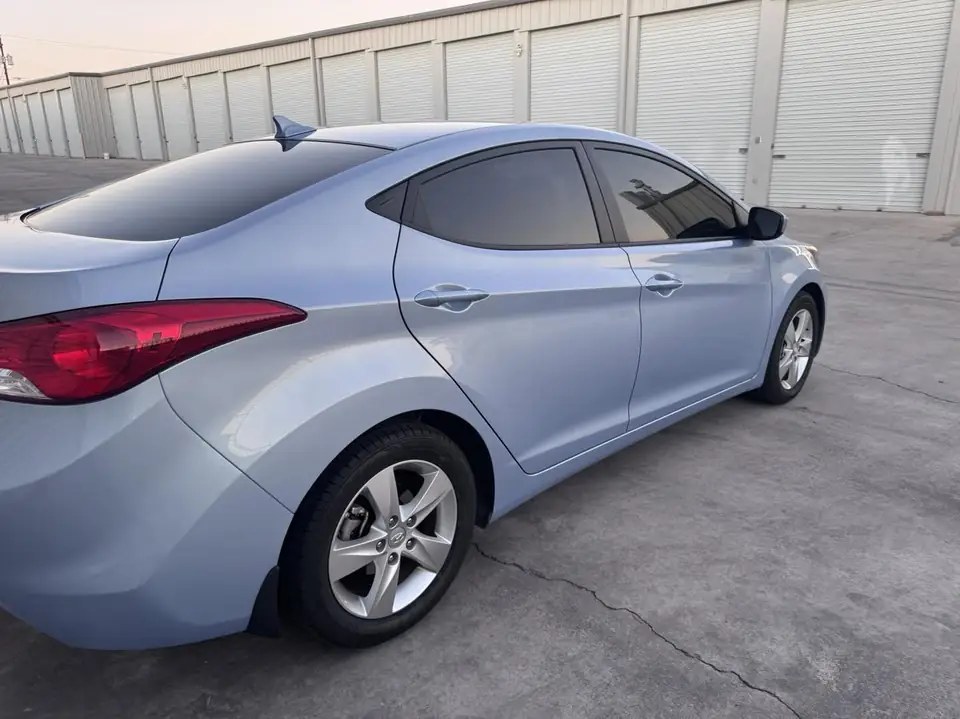 Hyundai Elantra window tint: Rolled this Hyundai Elantra out with our 15% C-IR on the sides and rear window, And a 50% C-IR on the full windshield (view 3)