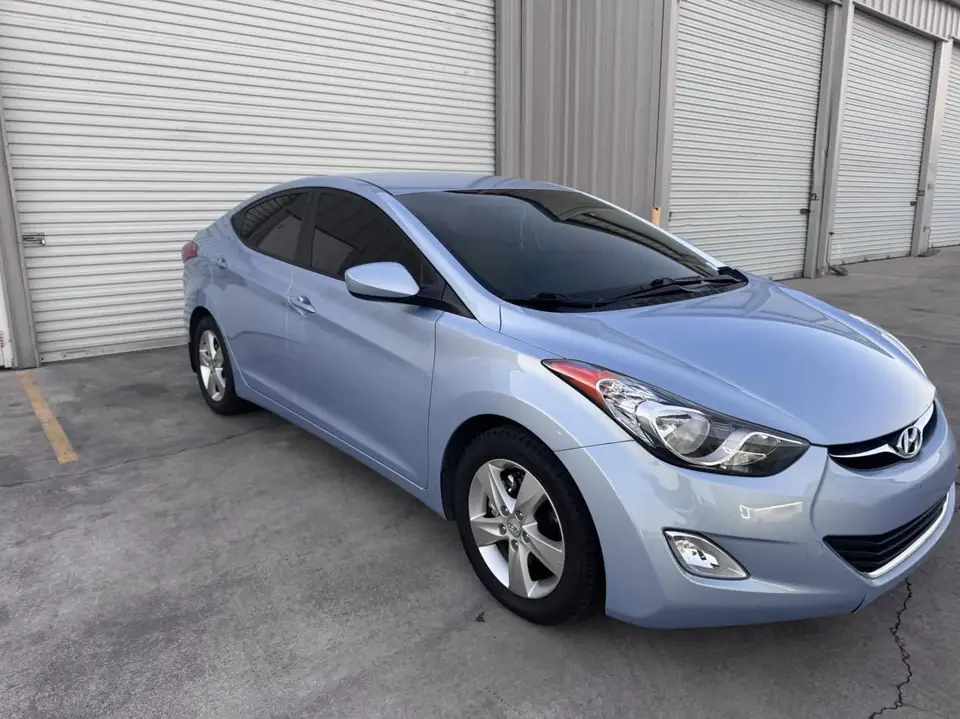 Hyundai Elantra window tint: Rolled this Hyundai Elantra out with our 15% C-IR on the sides and rear window, And a 50% C-IR on the full windshield (view 4)