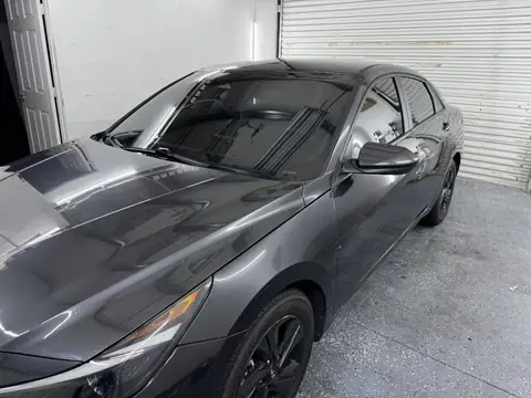 Hyundai Elantra windshield tint: Removed 70% windshield, Installed new 35% full windshield 3% sun strip
