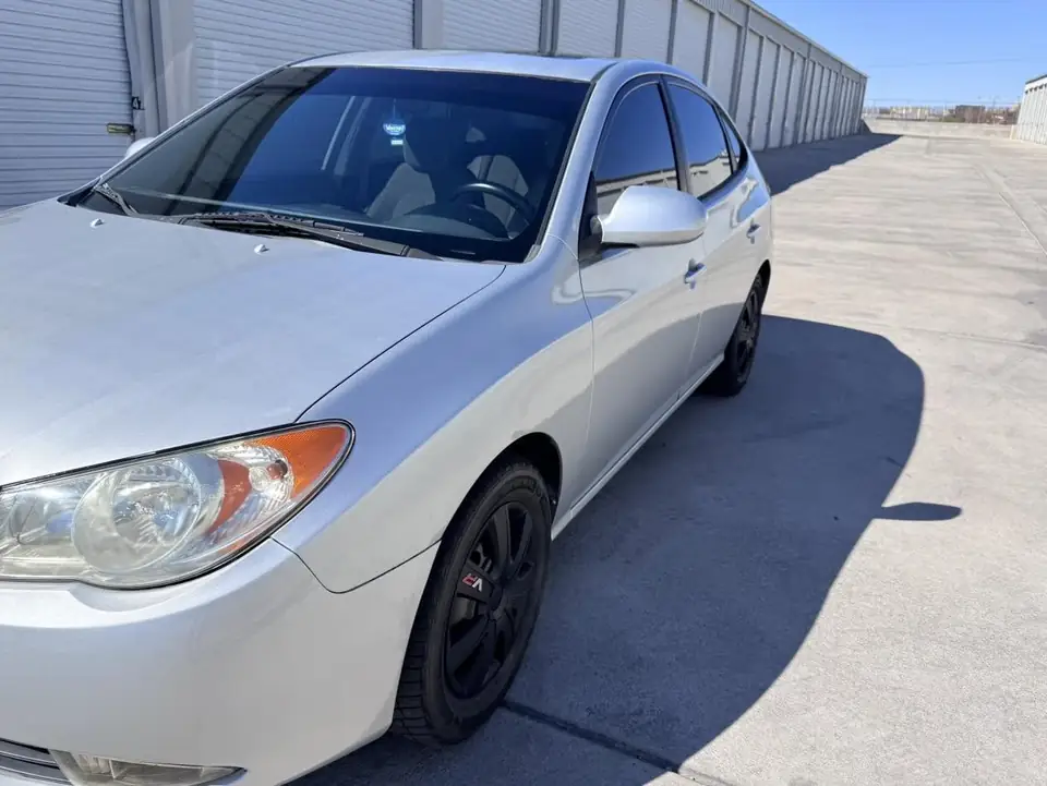 Hyundai Sonata window tint: 15% sides and rear, 5% sun strip (view 6)