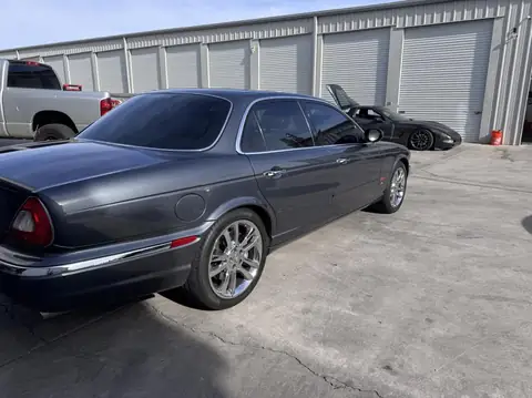 Jaguar sedan window tint: 15% rear half, 35% front doors, 5% sunstrip (view 3)