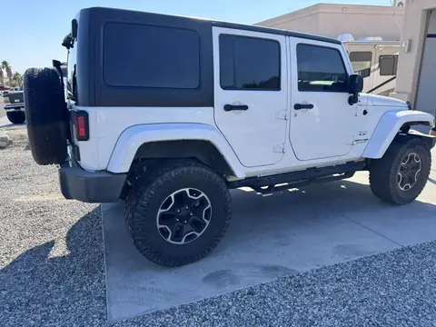 Jeep Wrangler window tint: 5% Carbon Ceramic rear doors and cargo windows, 15% Carbon Ceramic front doors, 5% Sunstrip