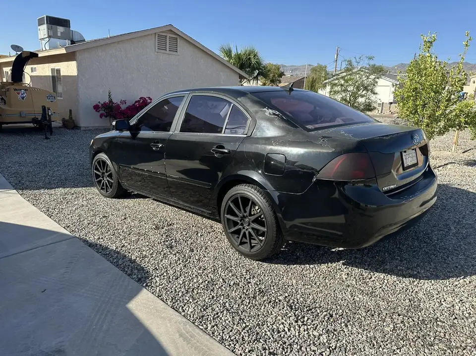 Kia Optima window tint: Removed all faded old tint, 5% rear 3 windows, 15% front doors (view 2)