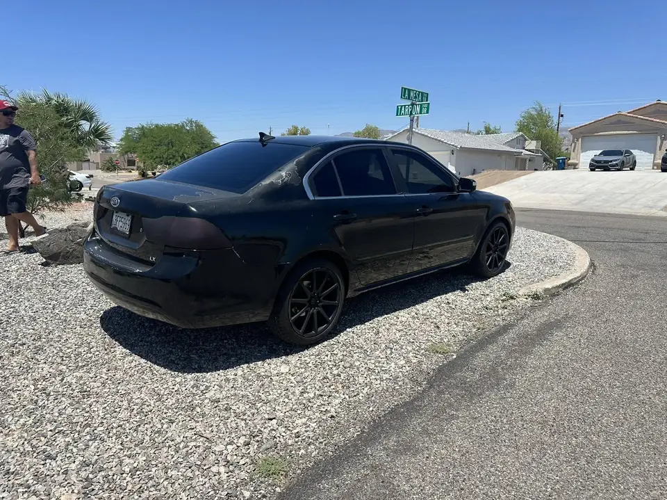 Kia Optima window tint: Removed all faded old tint, 5% rear 3 windows, 15% front doors (view 4)