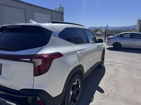 Kia Seltos window tint: 15% over rear half privacy windows, 35% front doors, 5% sunstrip (view 2)