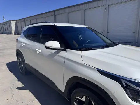 Kia Seltos window tint: 15% over rear half privacy windows, 35% front doors, 5% sunstrip (view 4)