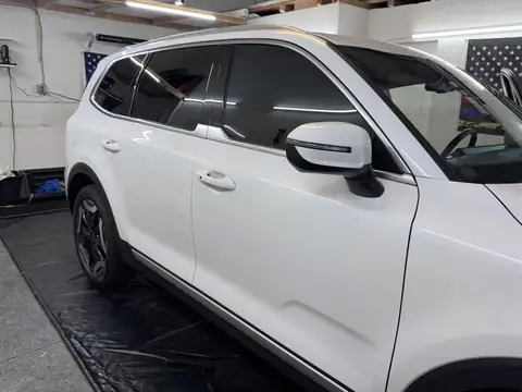 Kia Telluride window tint: Removed film from front doors, 5% all sides and rear, 5% sunstrip (view 2)