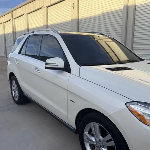 Mercedes SUV window tint: 15% over rear half privacy windows, 25% front doors, 50% full windshield
